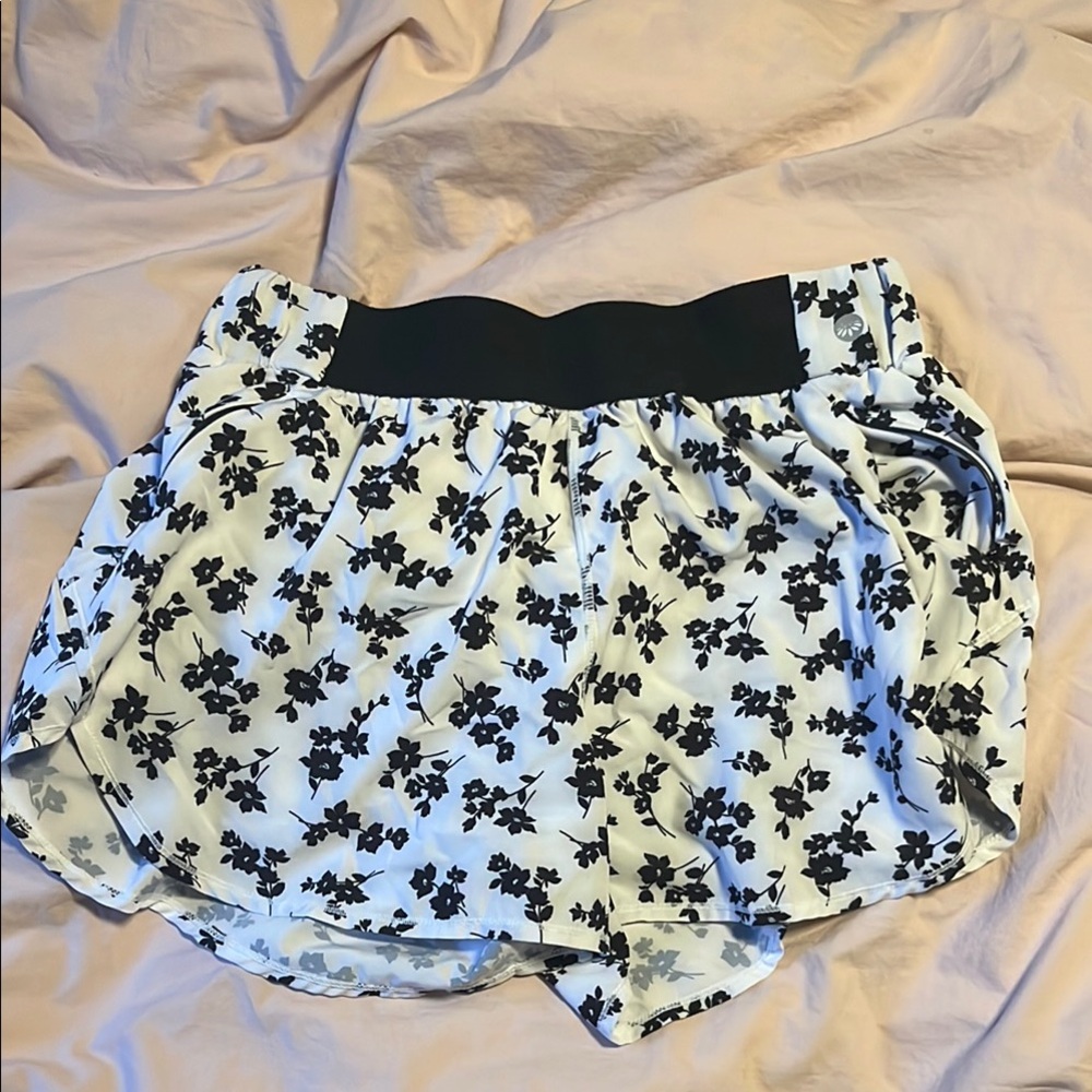 Black and White Athletic Shorts with Floral Pattern